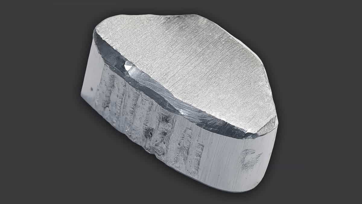 Pure aluminum metal sample with brushed silver surface and industrial finish, featured in an educational article on: what is aluminium (or aluminum).