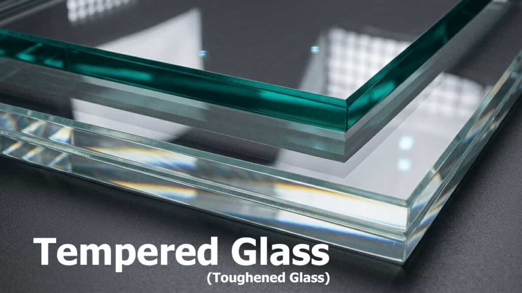 Multiple layers of thick polished tempered glass panels showcasing edge quality and clarity for window manufacturing.