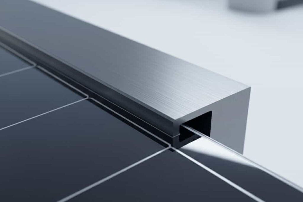 Close-up macro shot of a sleek, brushed anodized aluminium profile locking into the edge of a dark BIPV solar module.