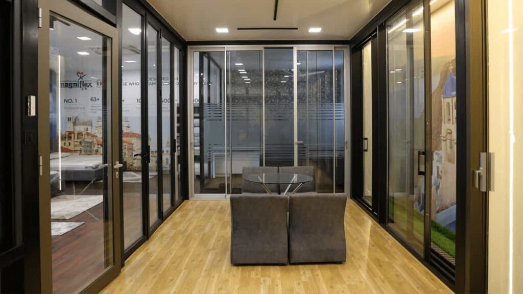Interior view of Alumil India’s Coimbatore experience centre featuring premium aluminium systems
