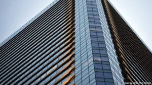 Aluminium 6060 curtain wall system on modern high rise building with glass facade and structural framing